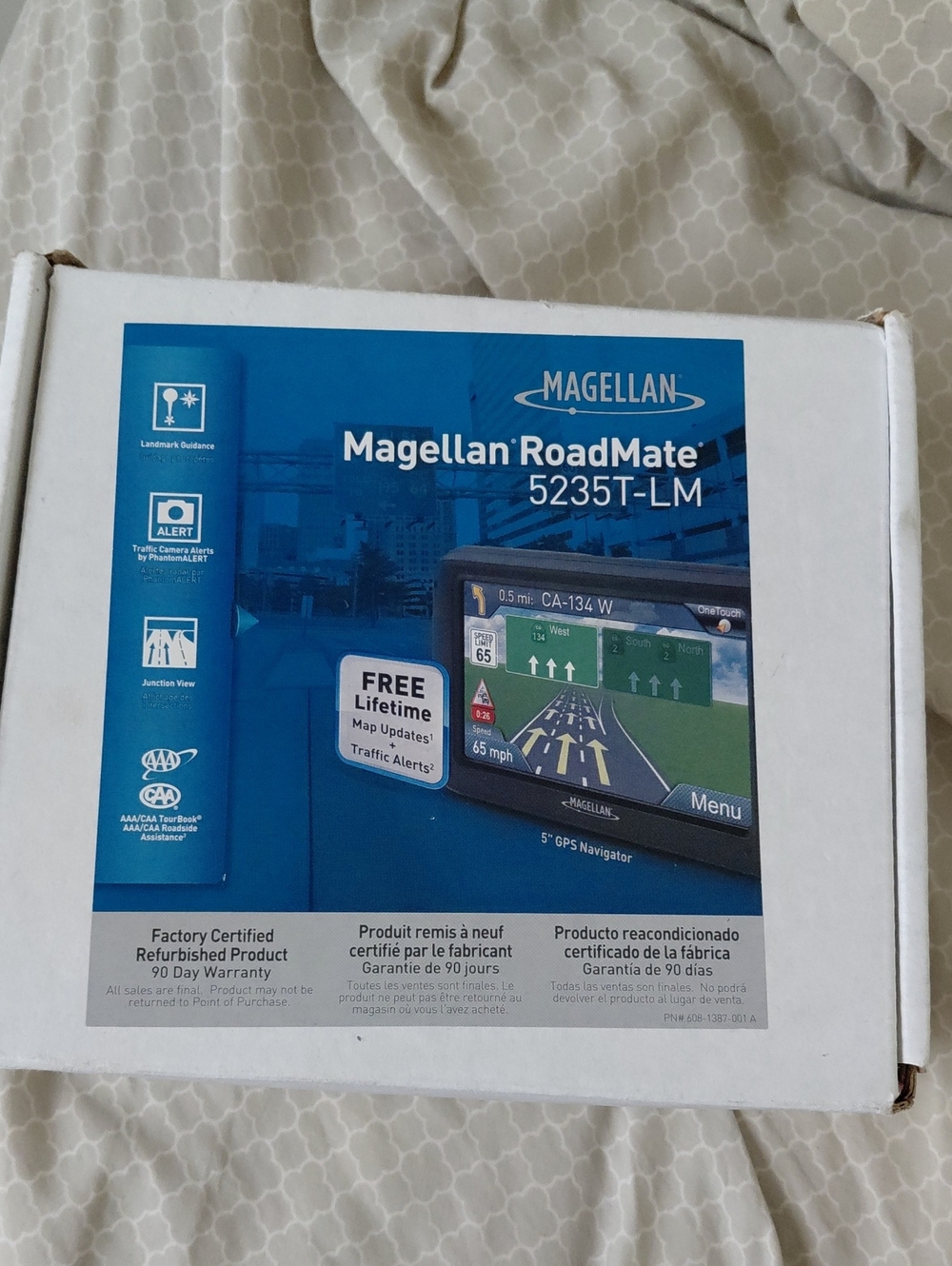 Magellan Outdoors RoadMate 5235T-LM GPS Navigator in blue and white packaging